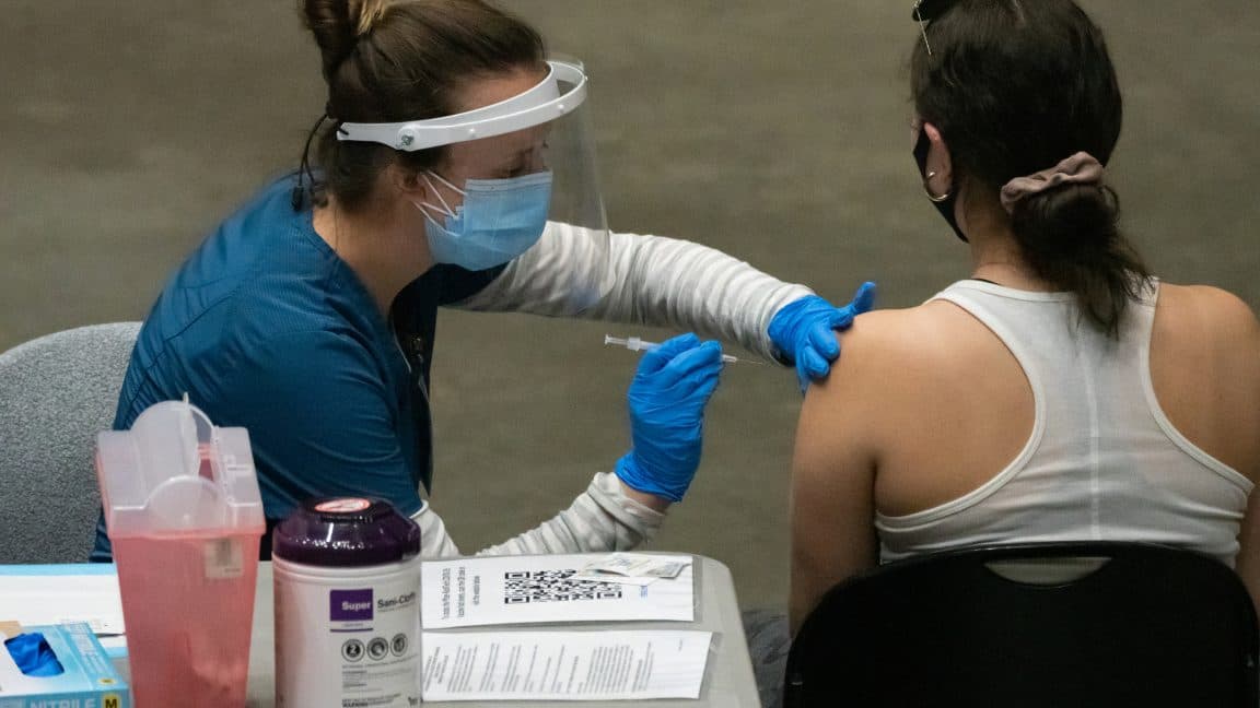 COVID vaccines still protect against heart problems, large study finds