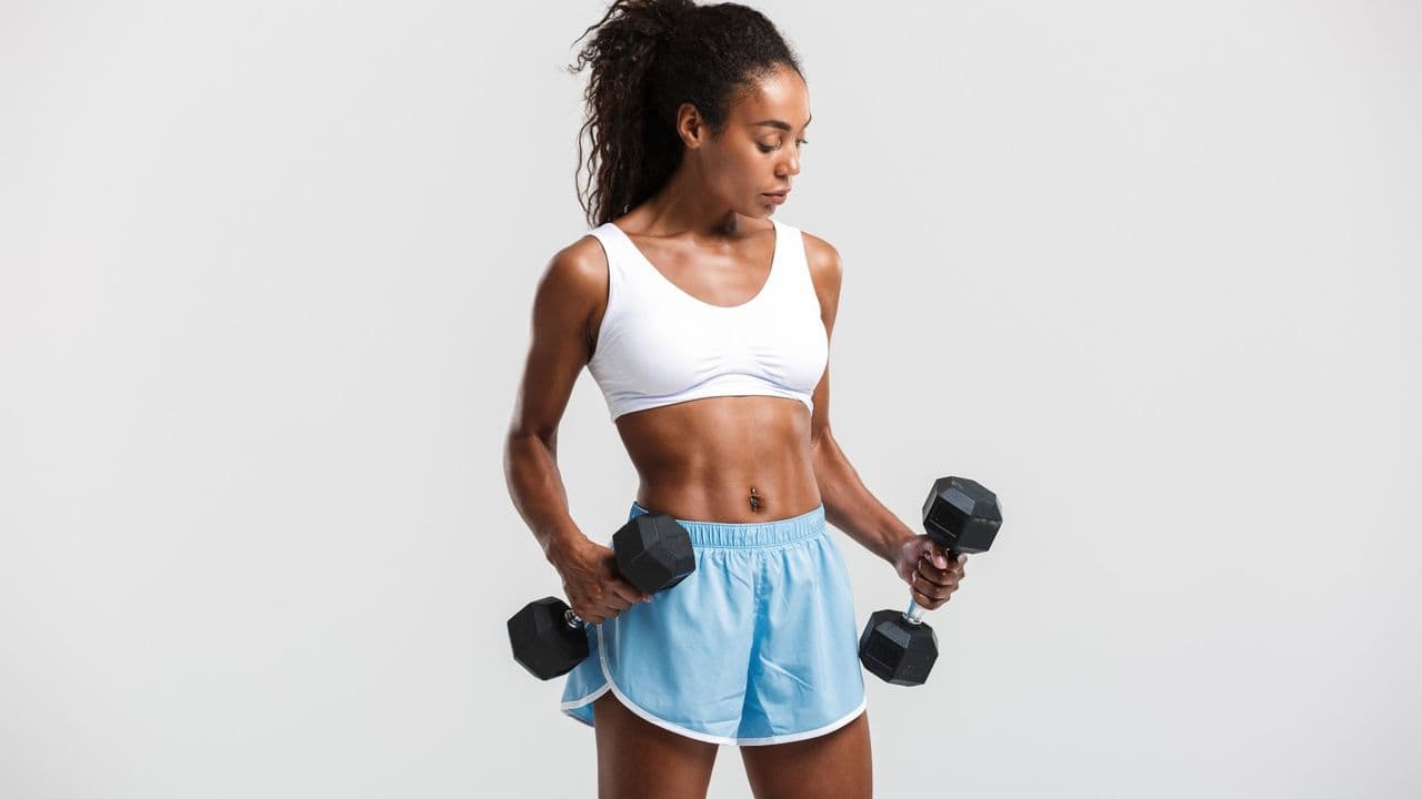 Forget Russian twists — hit your abs smarter with these 3 dumbbell moves that torch your core