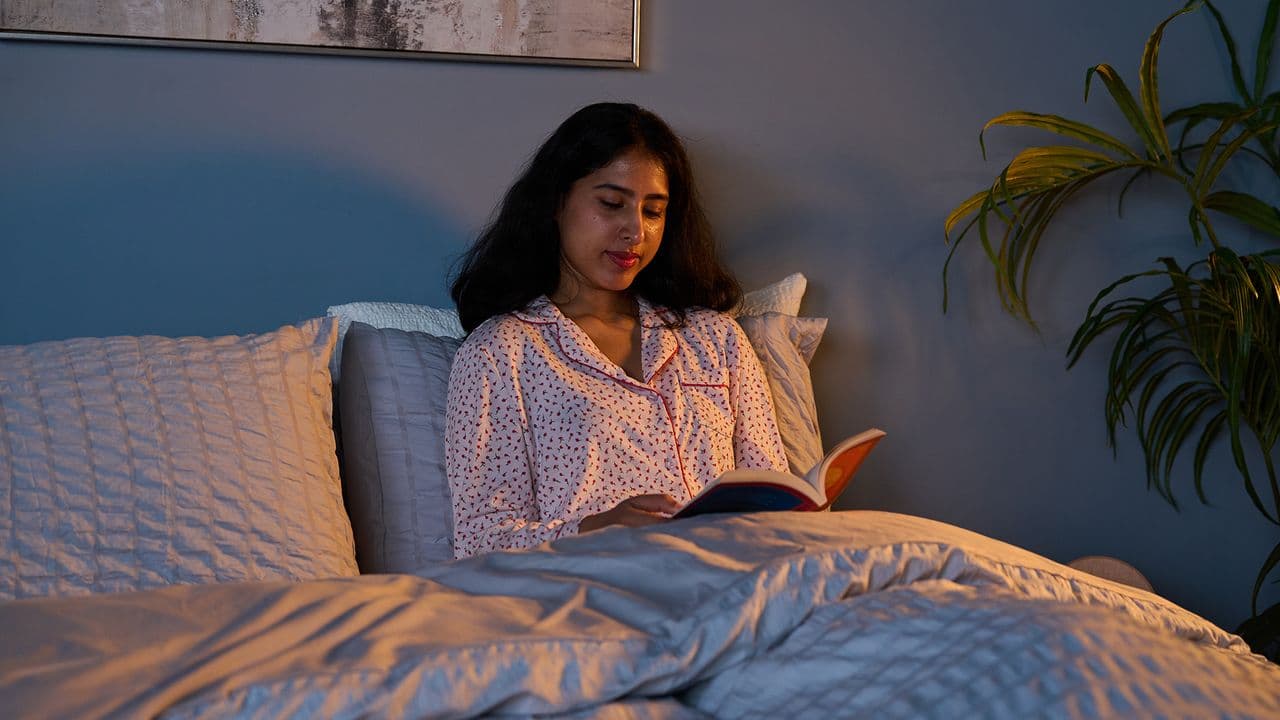 Reading in bed may be disrupting your sleep, experts reveal simple fix