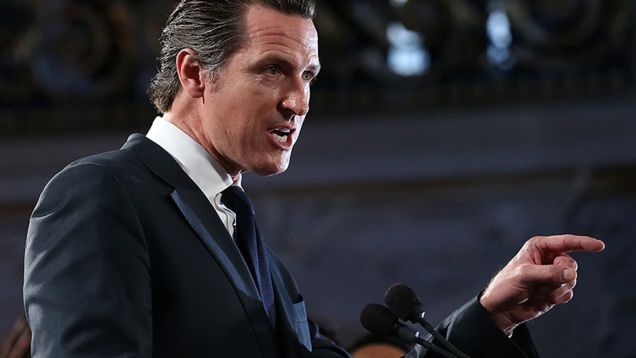 California to explore possible subsidies for companies that don’t replace workers with AI