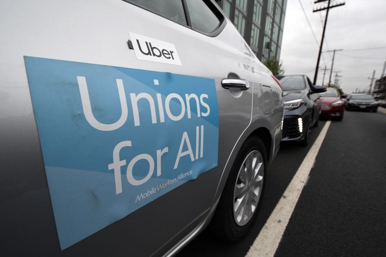 Massachusetts rideshare drivers achieve partial unionization milestone.