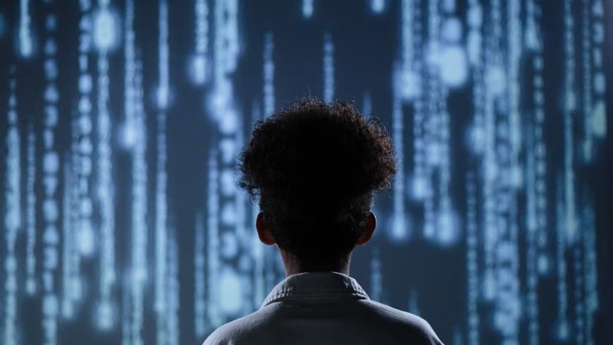 Token prices fell 98%. Enterprise AI bills tripled. Now the industry wants a standards body to explain why.